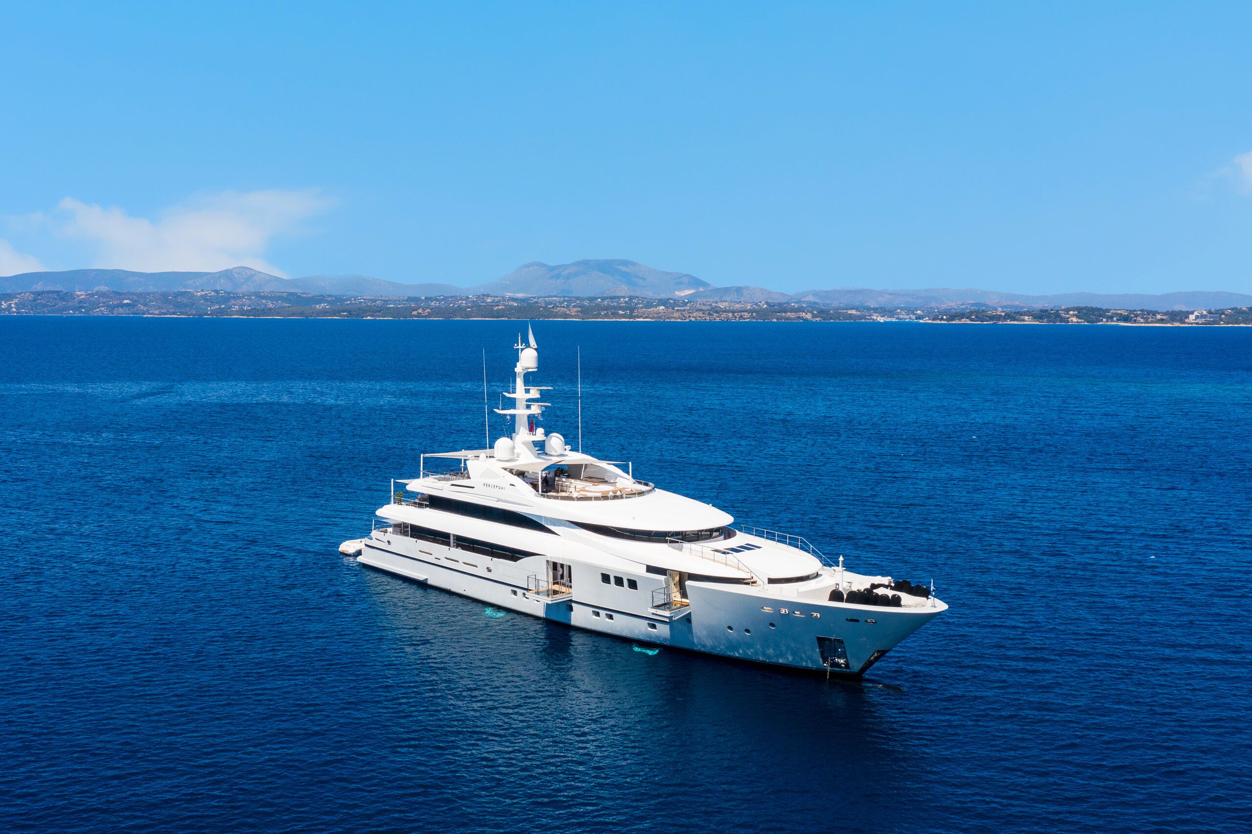 Side view of Persefoni I on the water