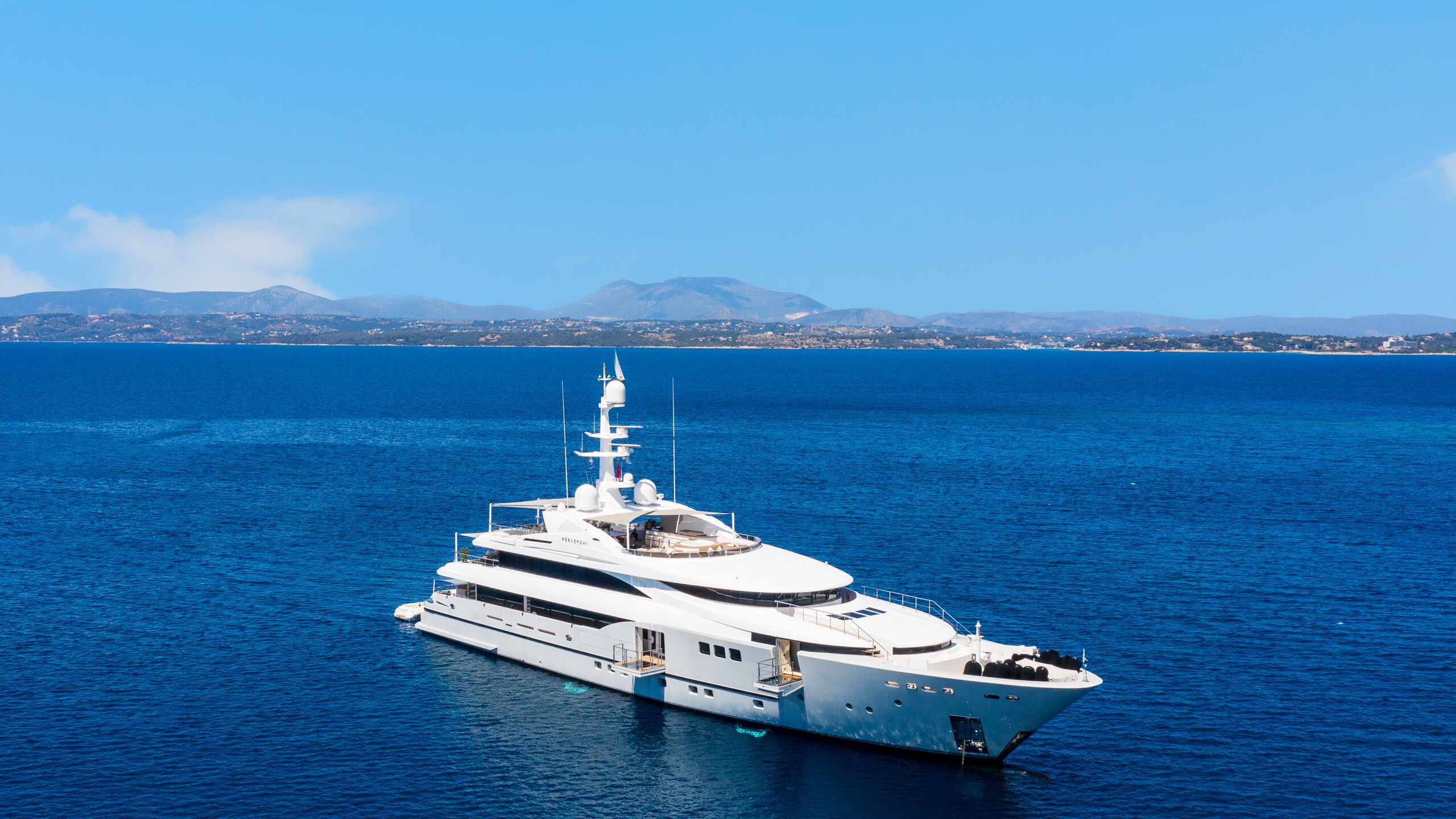 Side view of Persefoni I on the water