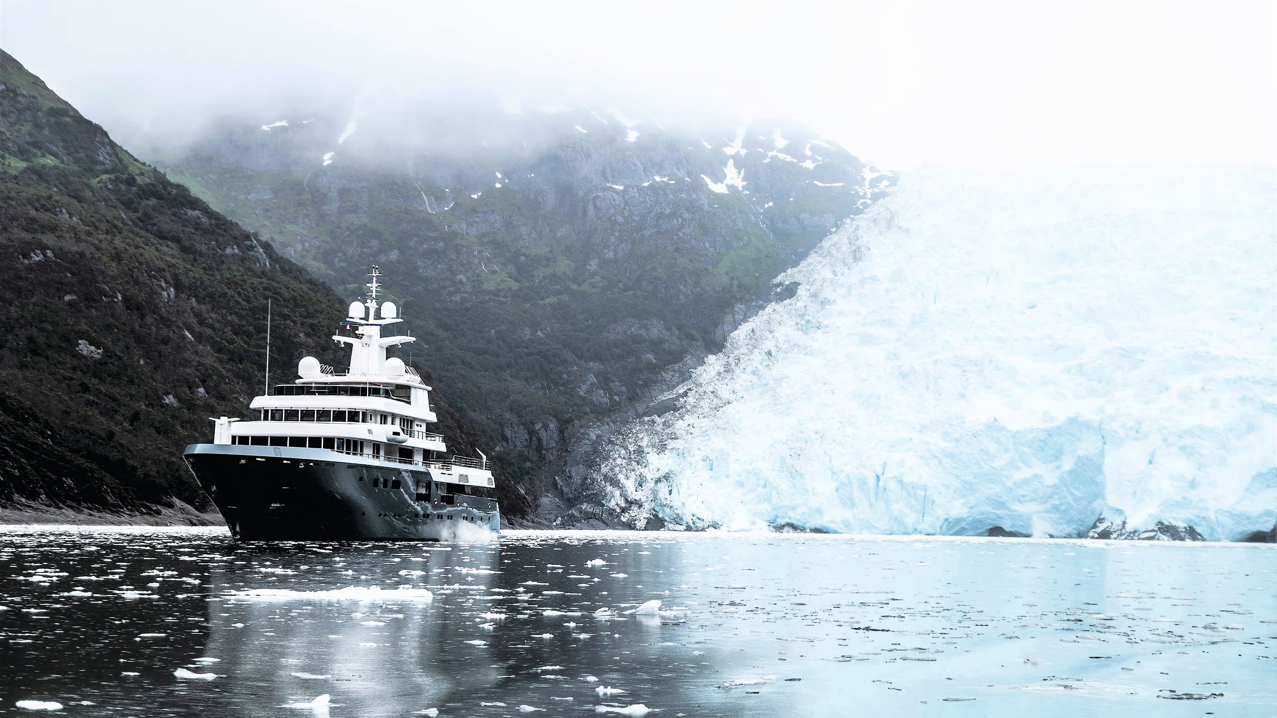 Planet Nine from the front/side on icy waters with misty glaciers in the background