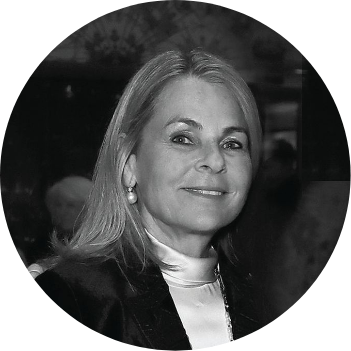 Black and white head and shoulders shot of Debra Reuben in a circular frame