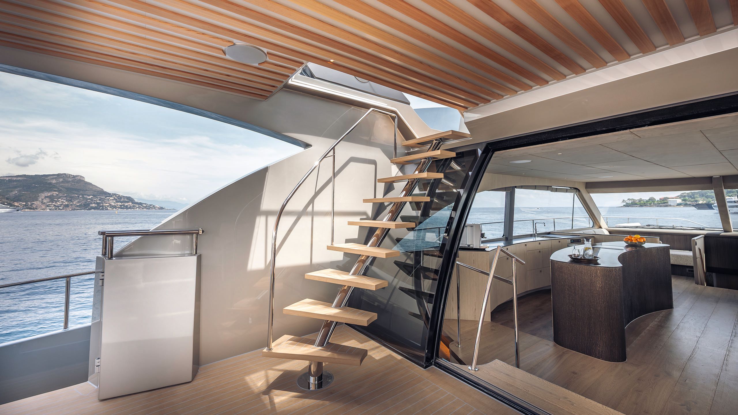 Staircase on a lower deck leading up to the top