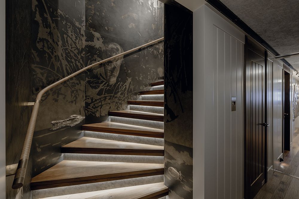 Staircase painted in jungle theme