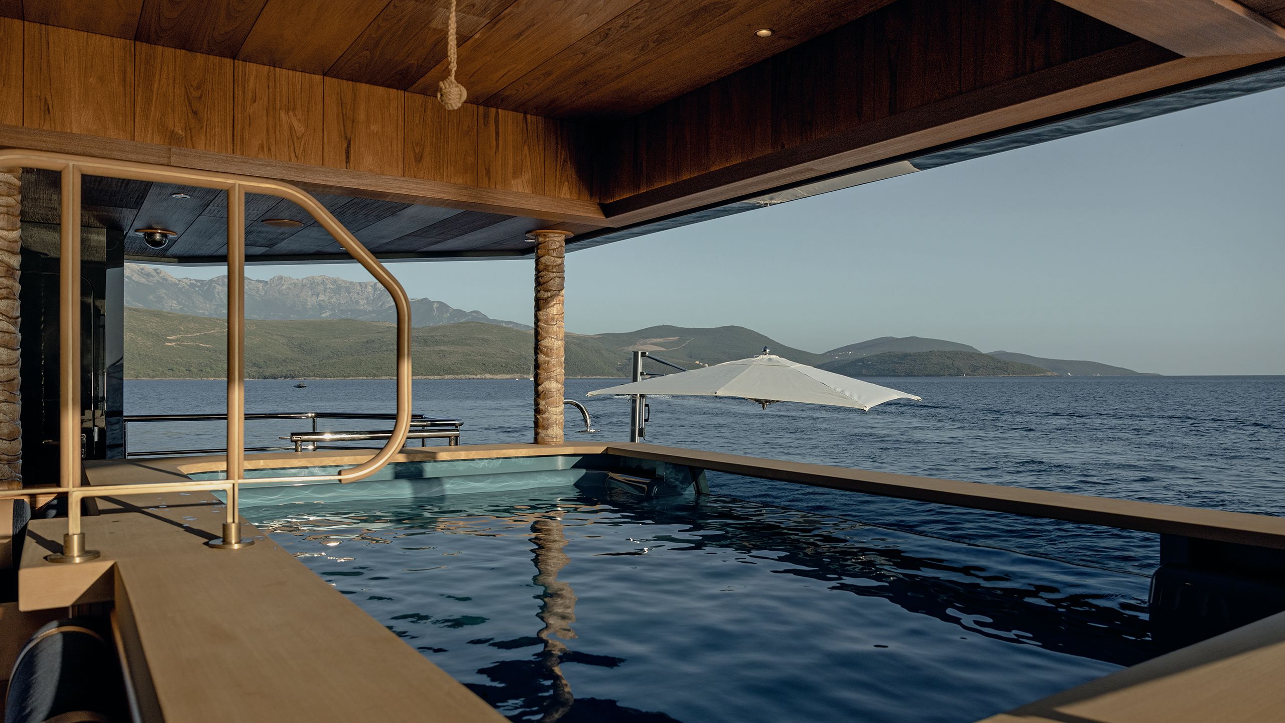 The glass-sided on-deck pool